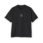 Black oversized tee with minimal chest graphic and relaxed fit