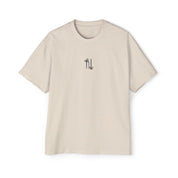 Ecru heavyweight tee with subtle chest mark and dropped shoulders.