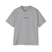 Gray t-shirt with 'I SHALL BE' text on a white background