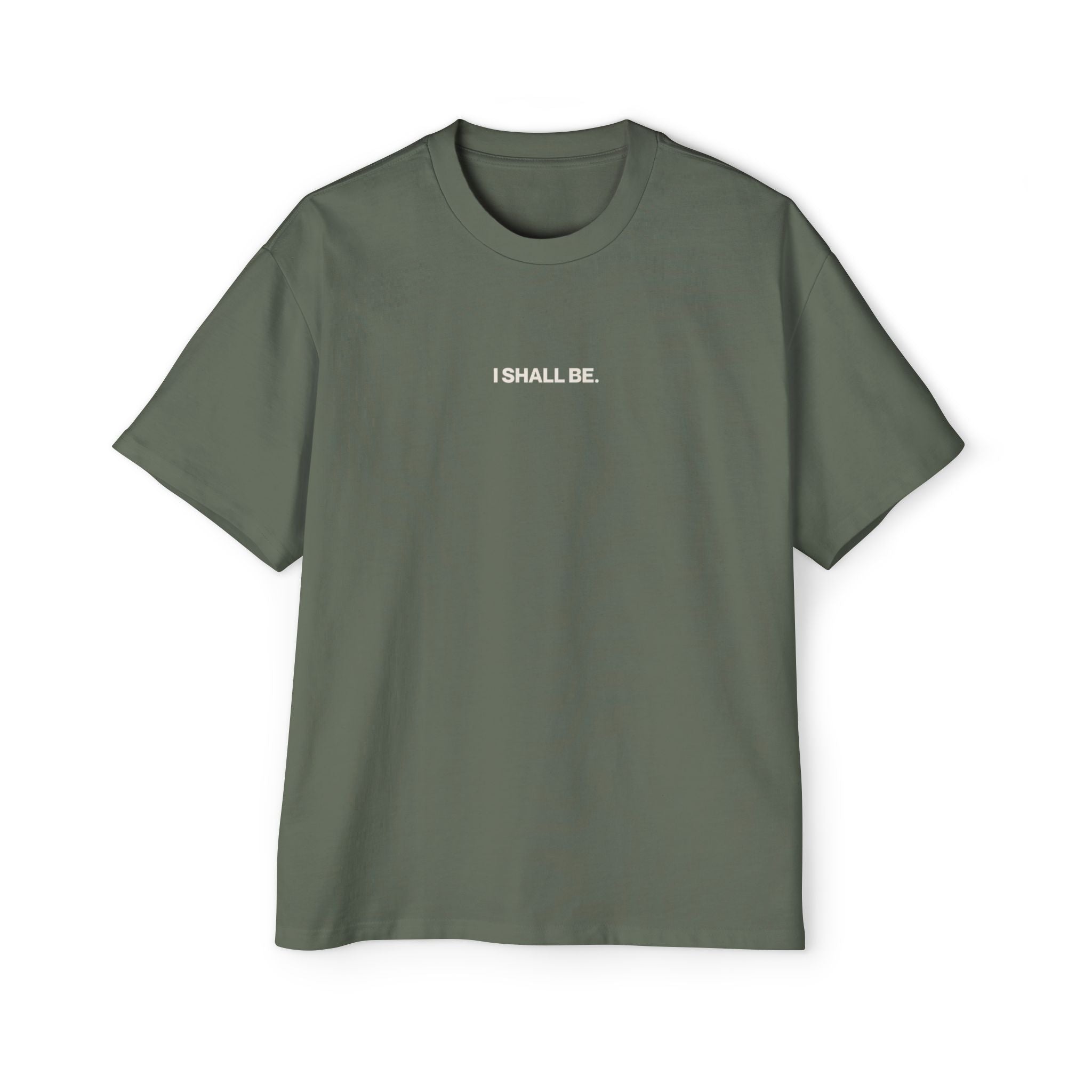 Green t-shirt with 'I SHALL BE.' text on a white background