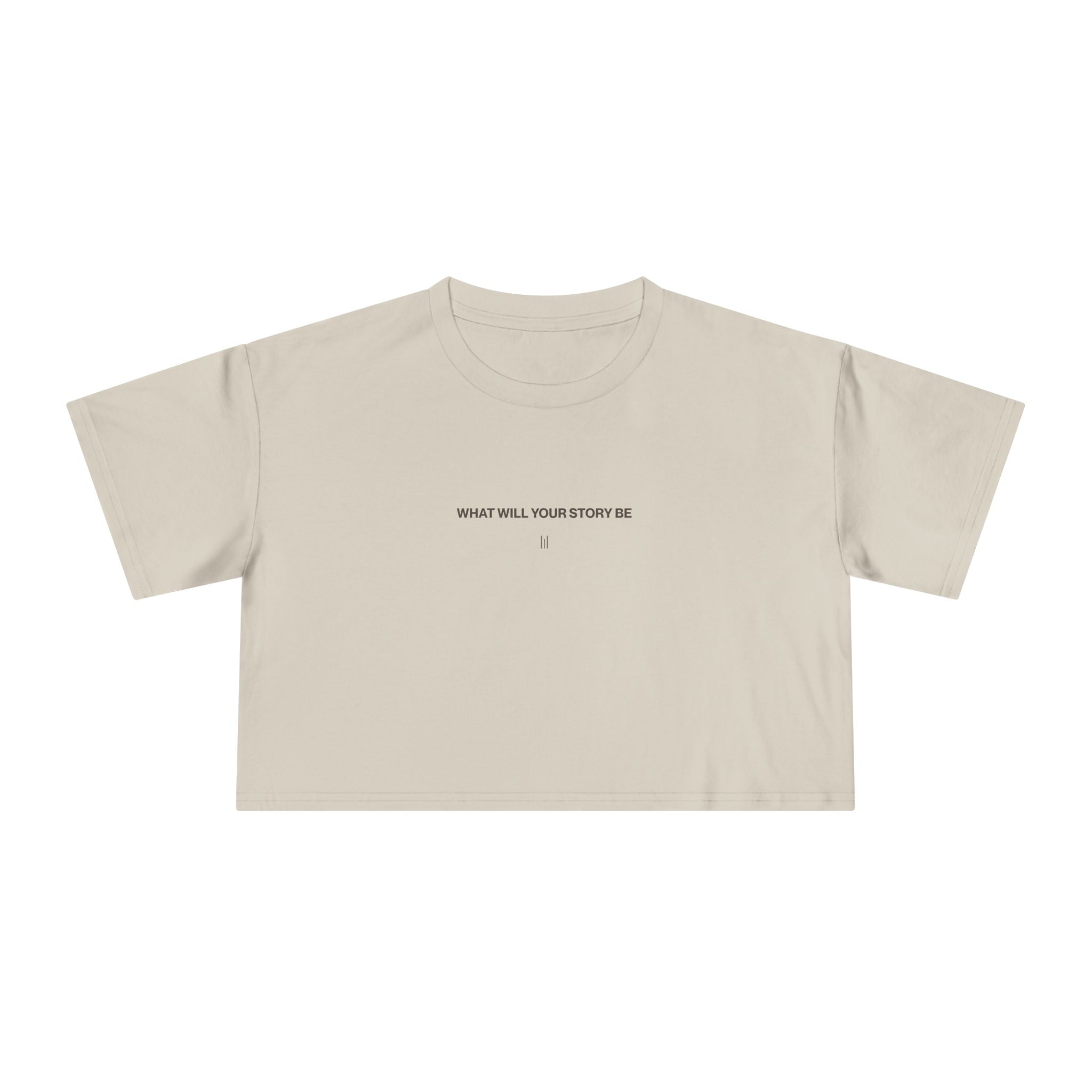 Beige crop top with text 'WHAT WILL YOUR STORY BE' on a white background